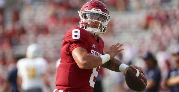 Oklahoma Sooners quarterback Dillon Gabriel drops back during a college football game.